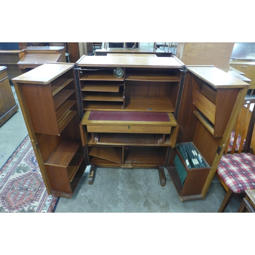 41 - A Newcraft Ltd. teak home office cabinet