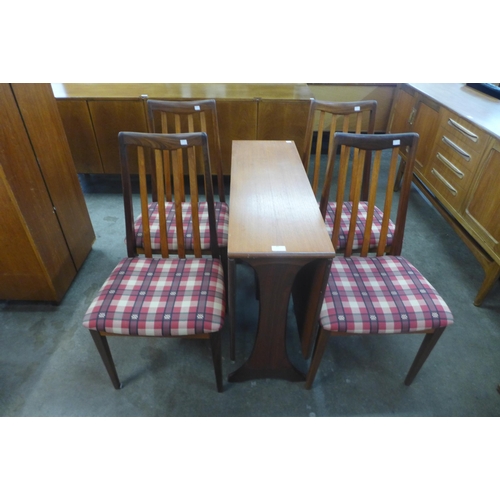 43 - A G-Plan Fresco teak drop leaf table and four chairs