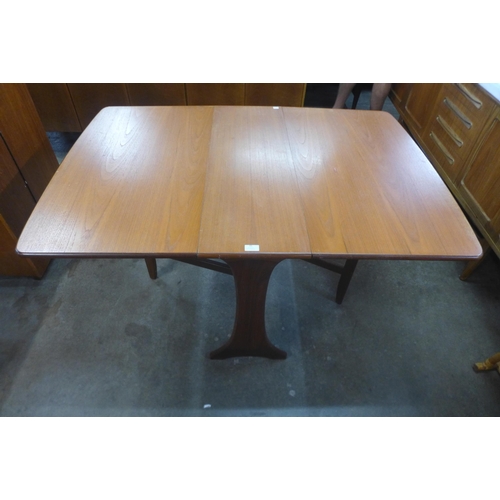 43 - A G-Plan Fresco teak drop leaf table and four chairs