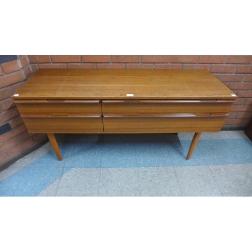 5 - A small Avalon teak four drawer sideboard