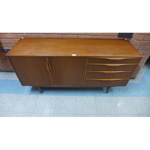 6 - A teak sideboard