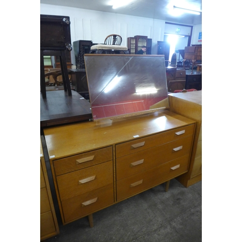 60 - A Stag Concorde light oak dressing table, by John & Sylvia Reid