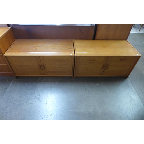 72 - Two teak chests of drawers and two teak cupboards