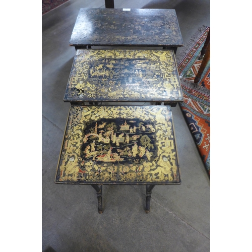 78 - A Regency black chinoiserie and gilt lacquered nest of tables