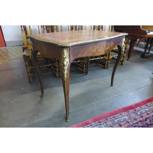 92 - A French marquetry inlaid rosewood and ormolu mounted single drawer bureau plat