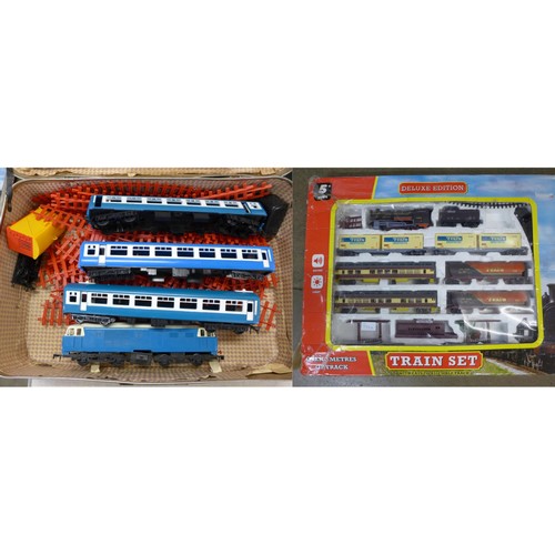 774A - Tri-ang 'Big Big Train' model rail locomotive, three coaches, one a/f, circus wagon, track with poin... 