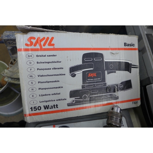 2005 - Black & Decker drill, Skil cordless drill, Skil orbital sander and 300mm tile cutter