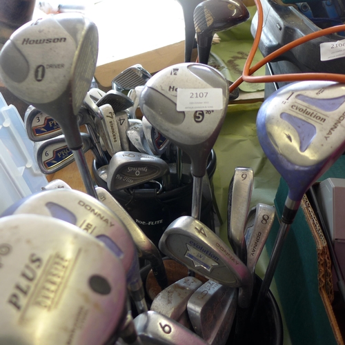 2107 - Various irons, drivers, putters, 4 golf bags & fold-up stool - W