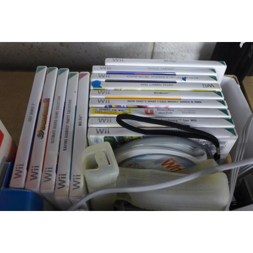 2227 - Nintendo Wii, wheels, 20 games including Wii Fit, 3 Nintendo DS consoles, 2 cases and 12 games plus ... 