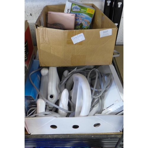 2227 - Nintendo Wii, wheels, 20 games including Wii Fit, 3 Nintendo DS consoles, 2 cases and 12 games plus ... 