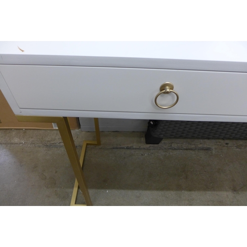 1378 - A white two drawer console table with gold legs