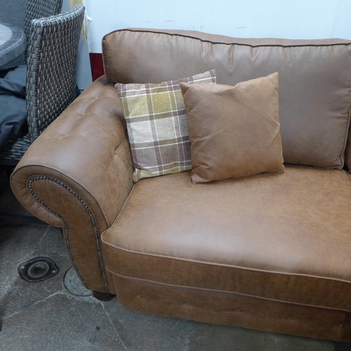 1392 - A County four seater sofa and armchair * this lot is subject to VAT