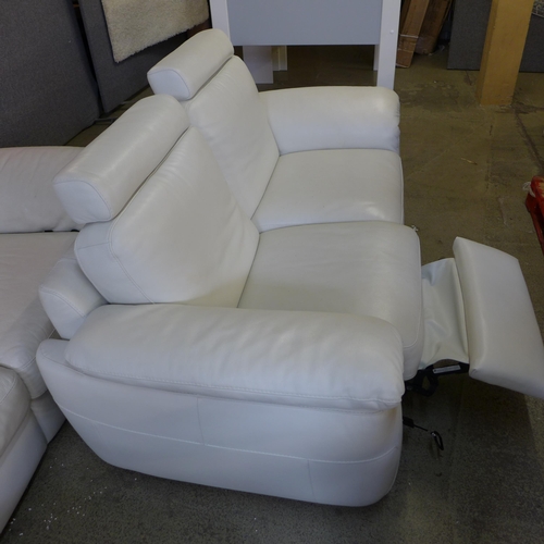 1486 - A Natuzzi cream two seater recliner and three seater sofa/chaise