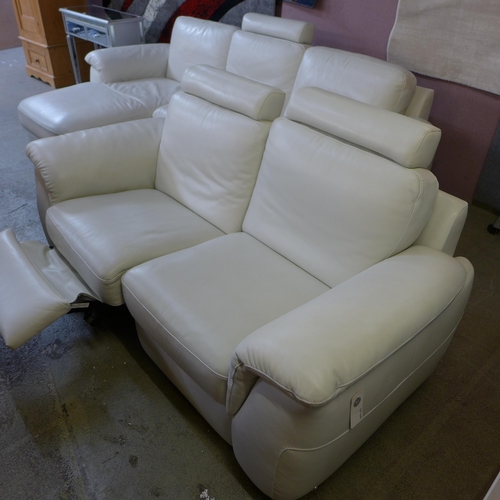 1486 - A Natuzzi cream two seater recliner and three seater sofa/chaise