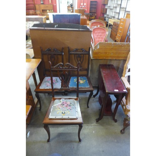 200 - Three Edward VII mahogany chairs and a Sutherland table