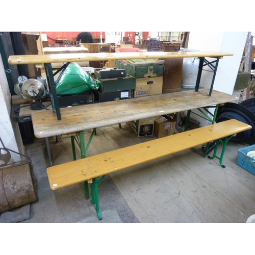 598 - A pine Bierkeller folding trestle table and two benches