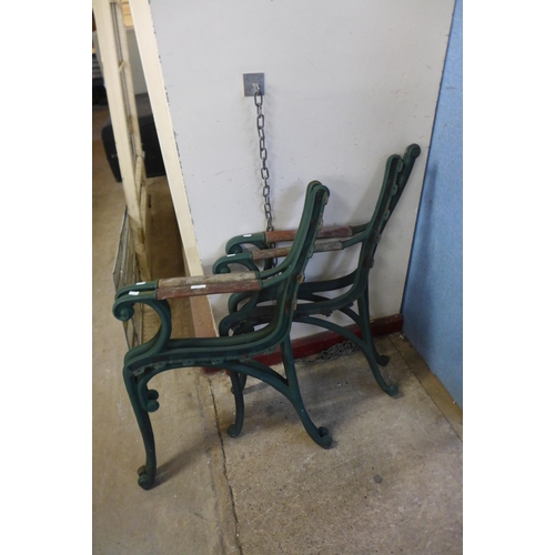 599 - Two pairs of cast iron bench ends