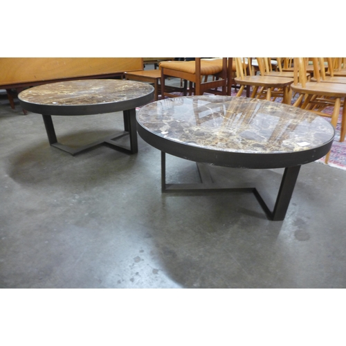 49 - A pair of contemporary Italian style marble topped circular coffee tables