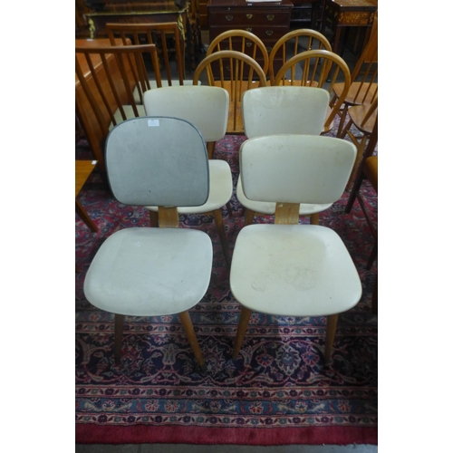 35a - A set of three bent plywood and vinyl kitchen chairs and another similar
