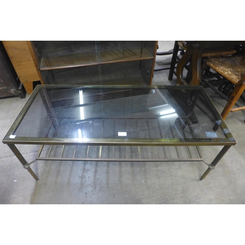 125 - An Italian brass and glass topped rectangular coffee table