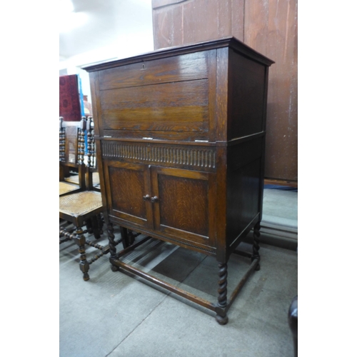 157 - An oak barleytwist cocktail cabinet