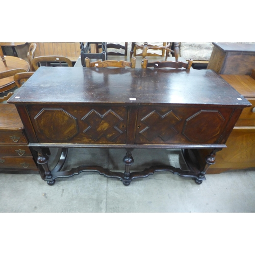 164 - A Jacobean Revival geometric inlaid walnut dresser