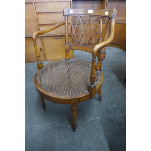 167 - An Edward VII satinwood library chair