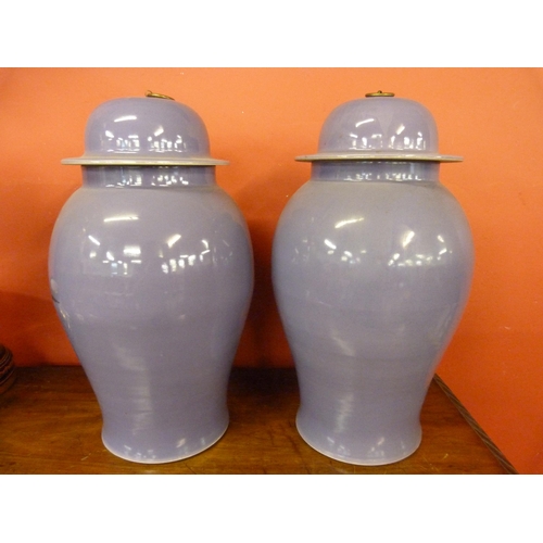 360 - A pair of large purple porcelain ginger jars and covers