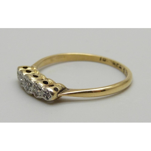 1027 - An 18ct gold, platinum and diamond set ring, 1.8g, M