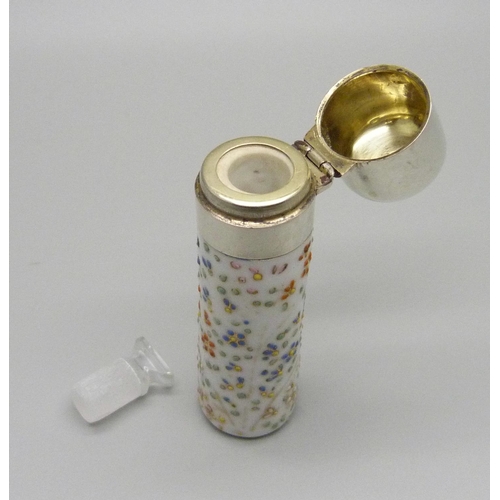 1034 - A silver top porcelain scent bottle, with inner stopper, (tests as silver)