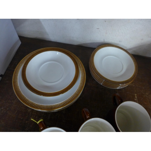 1046 - Six Poole cups, saucers and side plates