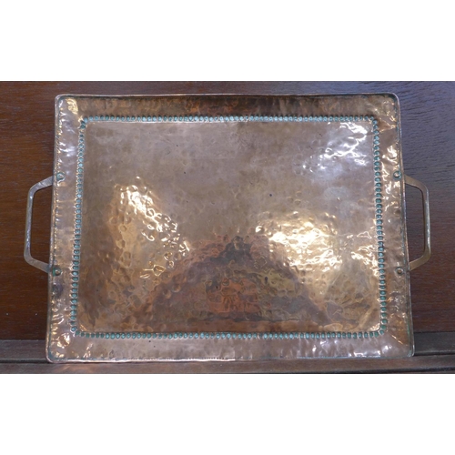 601 - John Pearson; an Arts and Crafts copper tray, stamped twice, 30cm x 39cm
