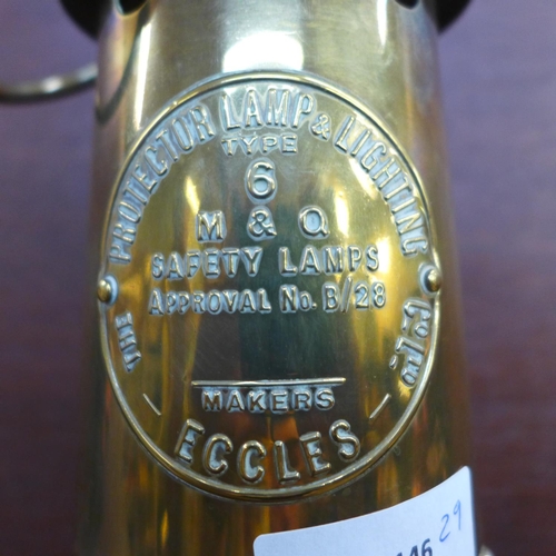 604 - An Eccles miner’s safety lamp and two smaller lamps