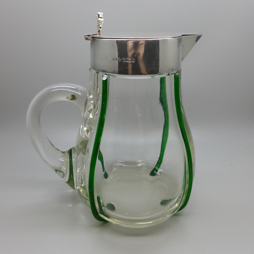 609 - An Art Nouveau silver topped glass jug with green trailing, maker M.W., Sheffield 1901, 19cm, (sligh... 