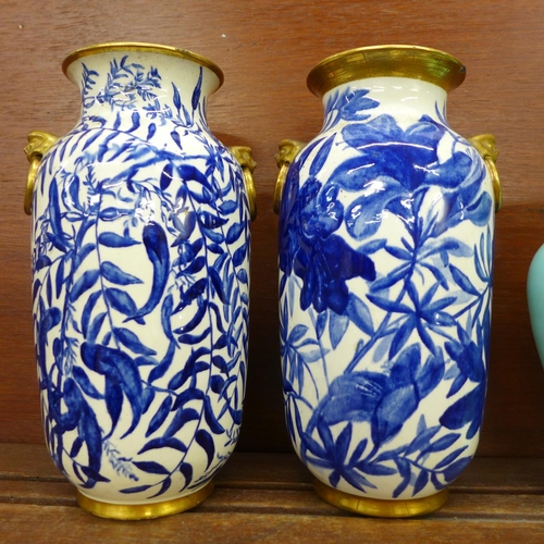 614 - A pair of glass vases decorated with flowers and butterflies, a Davenport jug and two similar blue a... 