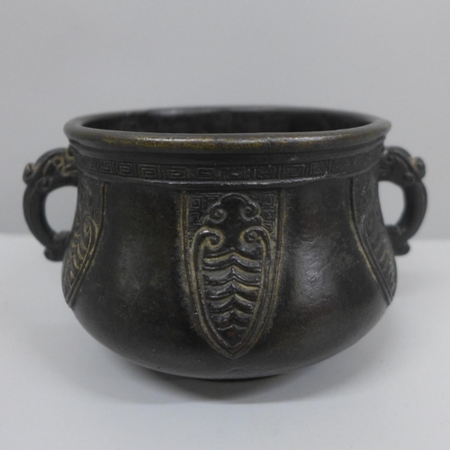 636 - A 19th Century cast bronze censer, diameter of top 9.5cm