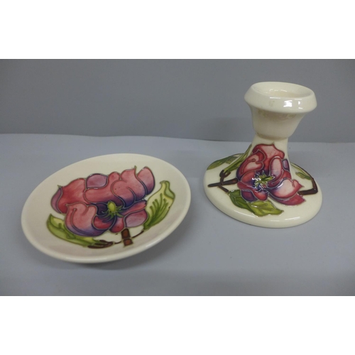 644 - A Moorcroft candlestick and pin dish