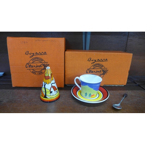 646 - A Wedgwood Clarice Cliff Blue Lucerne Cafe Noir Collection cup and saucer with spoon, and a sugar sh... 