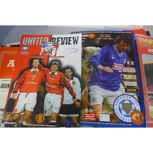 657 - Football memorabilia; Manchester United home and away programmes, 1954 onwards (32)