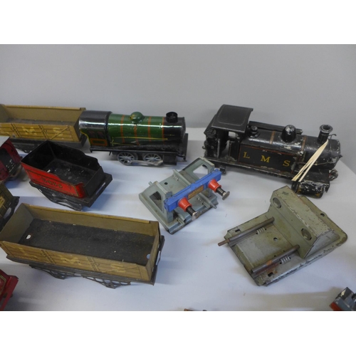 660 - A collection of Hornby 0 gauge wagons, a locomotive and carriages
