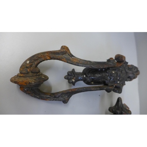 667 - Three cast iron door knockers