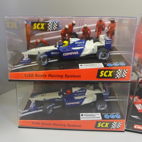 669 - Six Formula 1 model racing cars, three SCX and three Carrera, boxed