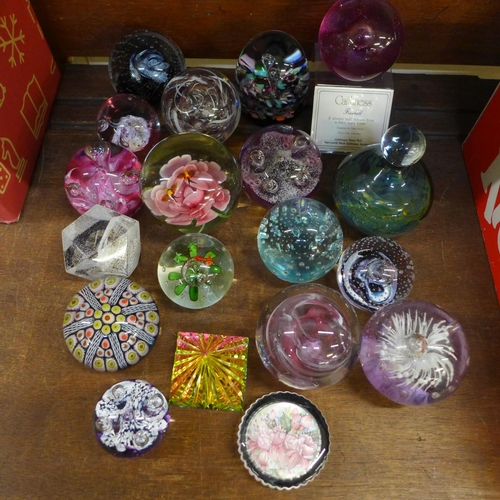 672 - A collection of glass paperweights including Caithness, Moonflower, Reflections, Fireball, Tango and... 