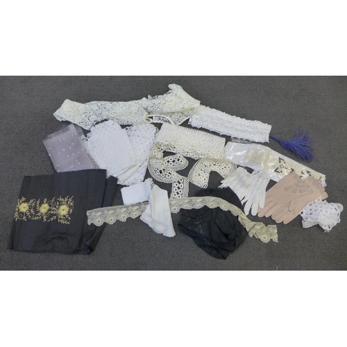 676 - A box of assorted lace and crochet work, etc., including a pair of crochet gloves, and a pair of lea... 