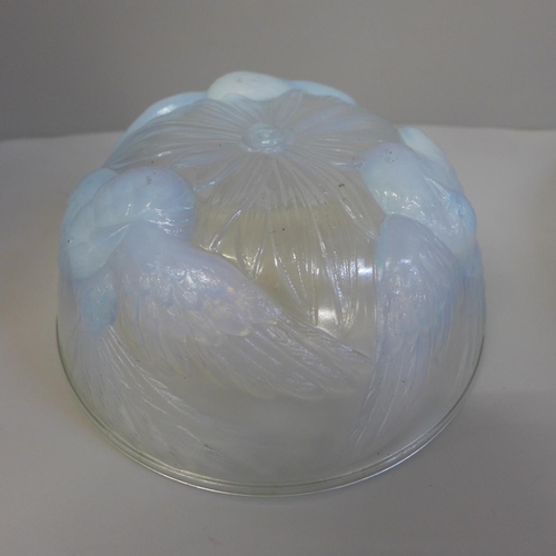 681 - A vaseline opalescent glass bowl and a blue glass bubble dish