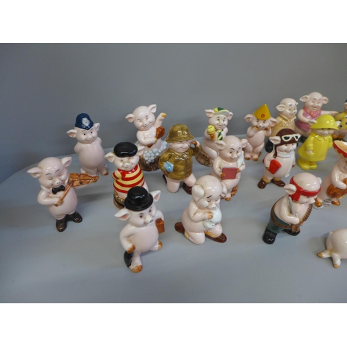 703 - A collection of 'Piggies' figures including Lester Piglet and Hambo