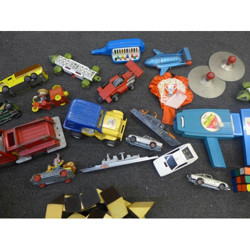 725 - A collection of vintage model vehicles including Matchbox, Dinky and Corgi magic Roundabout, play wo... 