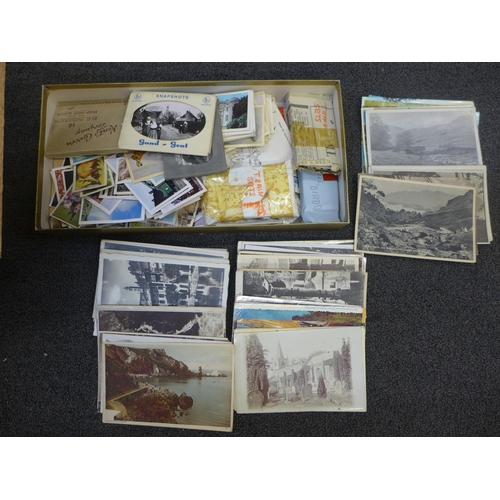 736 - A collection of postcards, etc.