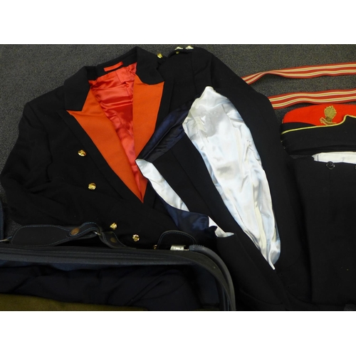 739 - A case containing two Royal Artillery uniforms