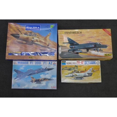 749 - Four model aircraft kits, Esci, 2x Heller and Fujimi